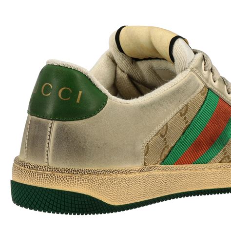 Sneakers in tela e pelle GG GUCCI da donna 